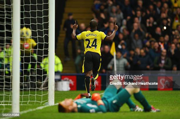 Adam Bogdan of Liverpool looks dejected as Odion Ighalo of Watford celebrates as he scores their third goal during the Barclays Premier League match...