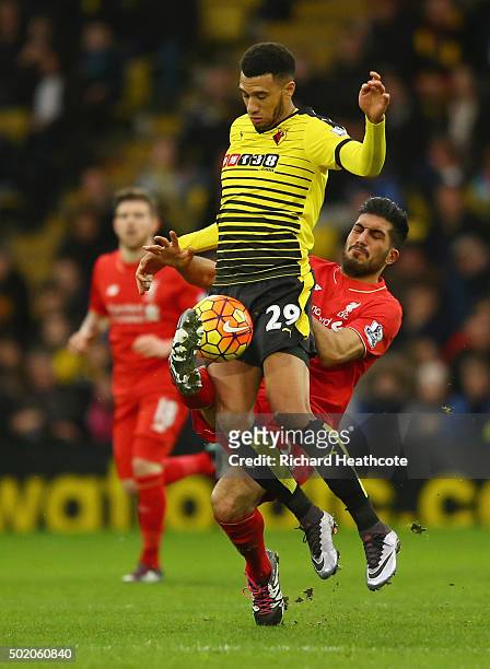 Etienne Capoue of Watford is tackled by Emre Can of Liverpool during the Barclays Premier League match between Watford and Liverpool at Vicarage Road...
