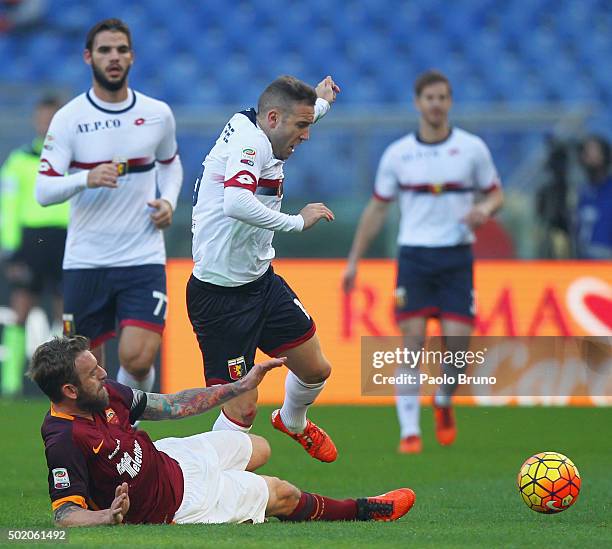 Daniele De Rossi of AS Roma competes for the ball with Diego Capel of Genoa CFC during the Serie A match between AS Roma and Genoa CFC at Stadio...