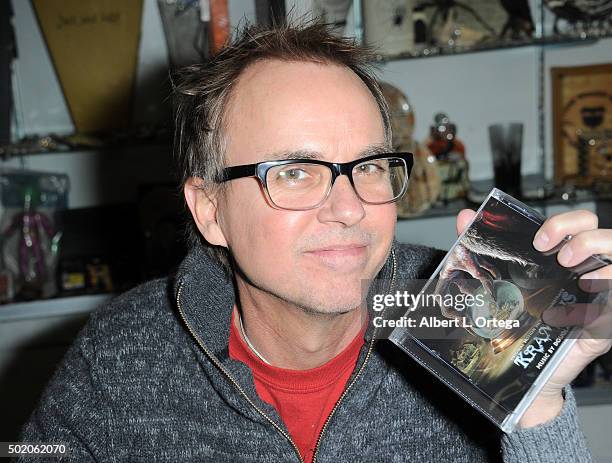 Composer Douglas Pipes poses with the 'Krampus" soundtrack at the Book Signing For "Crimson Peak: Art Of Darkness" held at Dark Delicacies Bookstore...