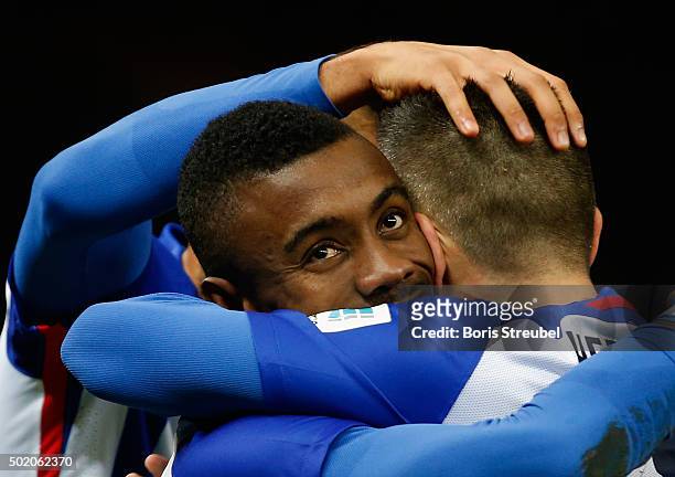 Salomon Kalou of Berlin celebrates after scoring his team's second goal with team mates during the Bundesliga match between Hertha BSC and 1. FSV...