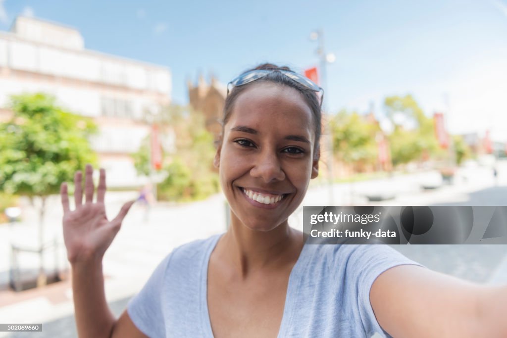 Young Aboriginal woman taking a selfie