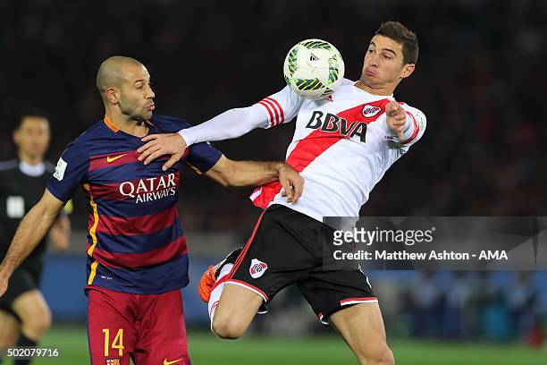 Javier Mascherano of FC Barcelona and Lucas Alario of River Plate during the FIFA Club World Cup Final Match between FC Barcelona and River Plate at...