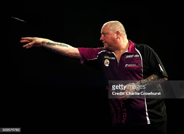 Andy Hamilton of Engand in action during his first round match against Joe Murnan of England during the 2016 William Hill PDC World Darts...