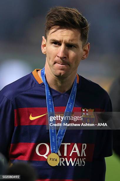 Lionel Messi of FC Barcelona with the winners medal around his neck during the FIFA Club World Cup Final Match between FC Barcelona and River Plate...