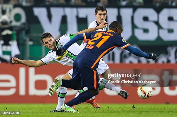 Granit Xhaka of Borussia Moenchengladbach and Anthony Ujah of Werder Bremen battle for the ball during the DFB-Cup match between Borussia...