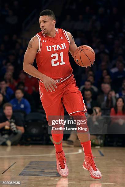 Jordan Loveridge of the Utah Utes dribbles up court against the Duke Blue Devils during the Ameritas Insurance Classic at Madison Square Garden on...