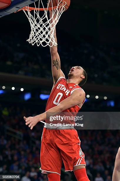 Brekkott Chapman of the Utah Utes goes to the basket against the Duke Blue Devils during the Ameritas Insurance Classic at Madison Square Garden on...