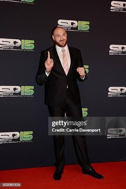 Tyson Fury poses on the red carpet before the BBC Sports Personality of the Year award at Odyssey Arena on December 20, 2015 in Belfast, Northern...