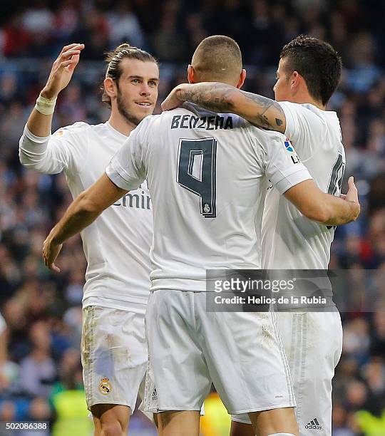Gareth Bale , Karim Benzema and James Rodriguez of Real Madrid celebrate after scoring during the La Liga match between Real Madrid CF and Rayo...