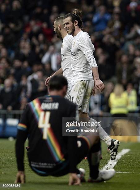 Karim Benzema of Real Madrid celebrates after scoring a goal during the La Liga match between Real Madrid CF and Rayo Vallecano at Estadio Santiago...