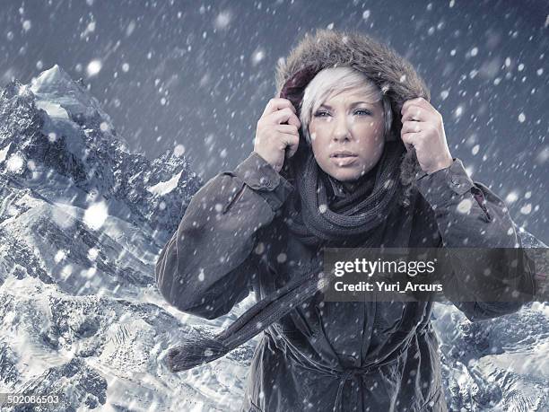 embracing the extreme - snow wind stock pictures, royalty-free photos & images