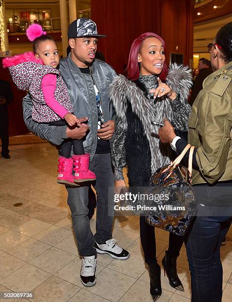 Laiyah Brown, Shannon Brown and Monica attend an in store Signing for Monicas new album "Code Red" at the Julian Scott boutique inside Phipps Plaza...