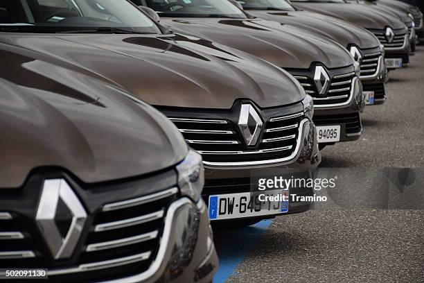 renault talisman cars on the parking - renault nissan stock pictures, royalty-free photos & images