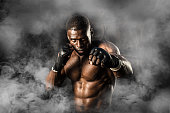 MMA Fighter On A Smokey  Background