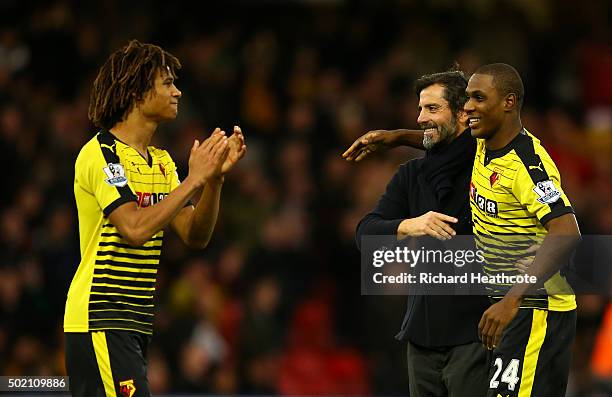 Quique Sanchez Flores, manager of Watford celebrates victory with goalscorers Nathan Ake and Odion Ighalo after the Barclays Premier League match...