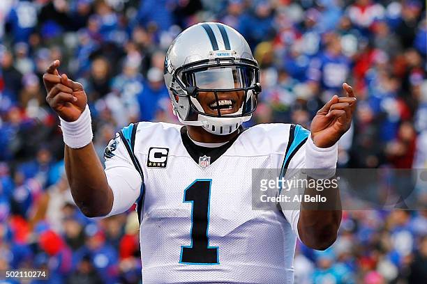 Cam Newton of the Carolina Panthers celebrates a touchdown in the third quarter against the New York Giants during their game at MetLife Stadium on...