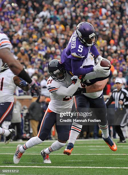 Quarterback Teddy Bridgewater of the Minnesota Vikings scores a touchdown against Ryan Mundy of the Chicago Bears during the fourth quarter of the...