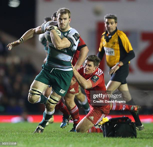 Tom Croft of Leicester breaks with the ball during the European Rugby Champions Cup match between Leicester Tigers and Munster at Welford Road on...