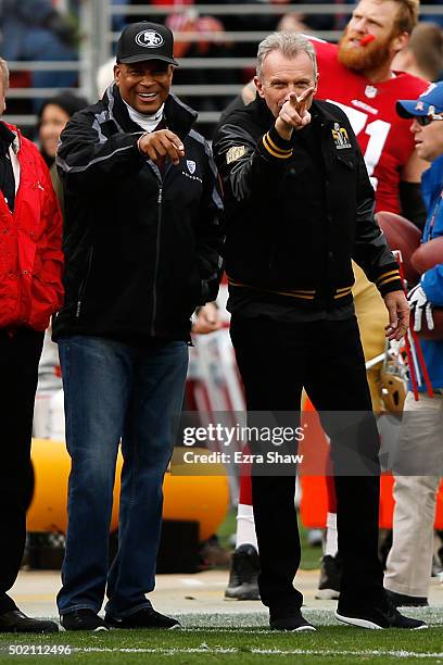 Former San Francisco 49ers Joe Montana and Ronnie Lott stand on the sidelines during the NFL game between the San Francisco 49ers and the Cincinnati...