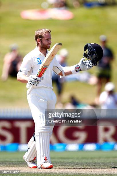Kane Williamson of New Zealand raises his bat as he makes a century during day four of the Second Test match between New Zealand and Sri Lanka at...