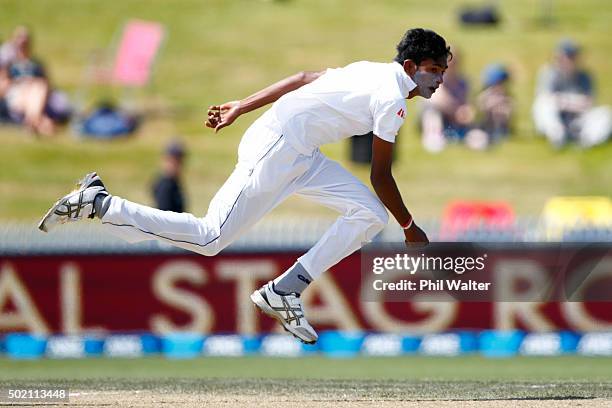 Dushmantha Chameera of Sri Lanka bowls during day four of the Second Test match between New Zealand and Sri Lanka at Seddon Park on December 21, 2015...