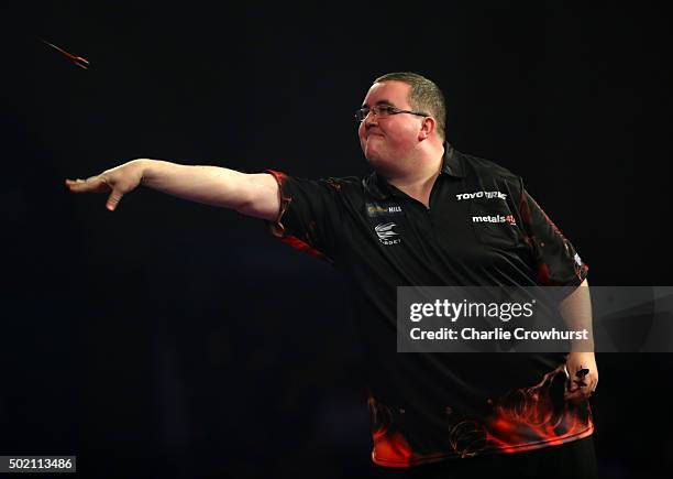 Stephen Bunting of England in action during his first round match against Jyhan Artut of Germany during the 2016 William Hill PDC World Darts...