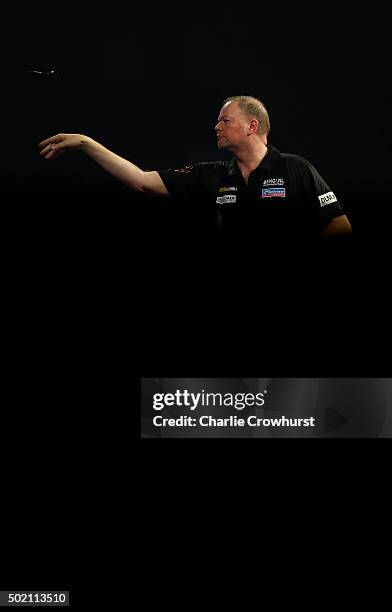 Raymond van Barneveld of Holland in action during his first round match against Dirk van Duijvenbode during the 2016 William Hill PDC World Darts...