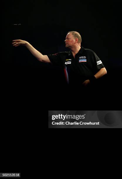 Raymond van Barneveld of Holland in action during his first round match against Dirk van Duijvenbode during the 2016 William Hill PDC World Darts...