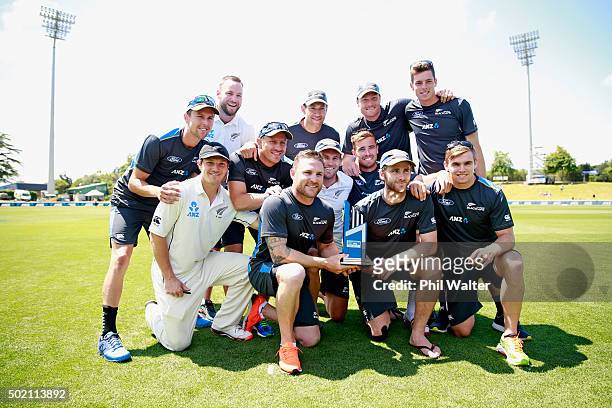 The New Zealand Blackcaps pose with the series winning trophy following day four of the Second Test match between New Zealand and Sri Lanka at Seddon...