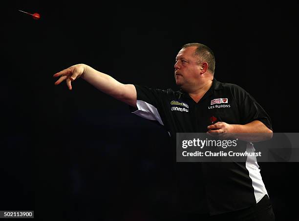 Mervyn King of England in action during his first round match against Aleksandr Oreshkin of Russia during the 2016 William Hill PDC World Darts...