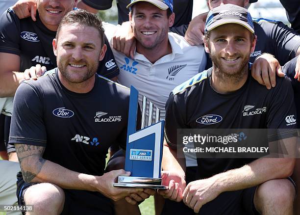 Brendon McCullum and Kane Williamson of New Zealand hold the trophy after day four of the second Test cricket match between New Zealand and Sri Lanka...