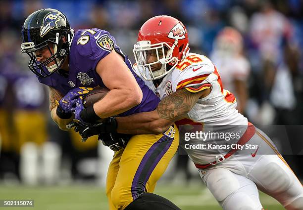 Kansas City Chiefs inside linebacker Derrick Johnson tackles Baltimore Ravens tight end Maxx Williams in the fourth quarter on Sunday, Dec. 20 at M&T...