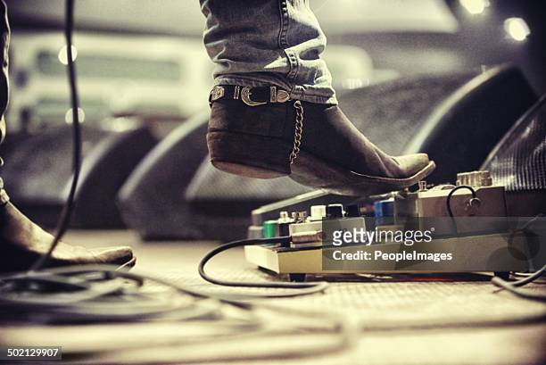 controlling the music - country and western music stock pictures, royalty-free photos & images