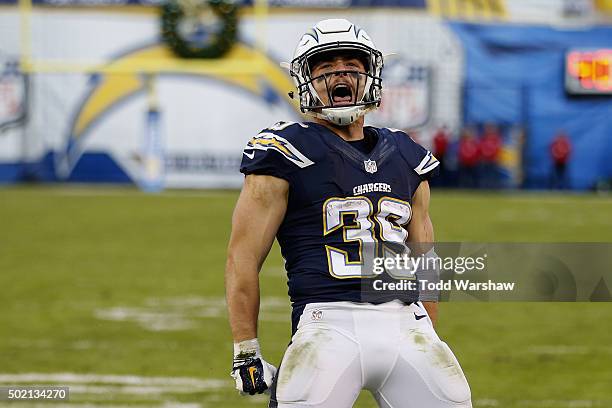 Danny Woodhead of the San Diego Chargers celebrates after scoring his 4th touchdown of the game as the Chargers defeated the Miami Dolphins 30-14 at...