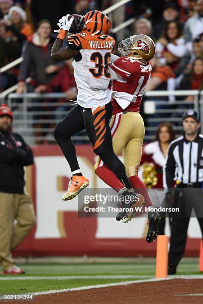 Shawn Williams of the Cincinnati Bengals intercepts a pass intended for Jerome Simpson of the San Francisco 49ers in the endzone during their NFL...