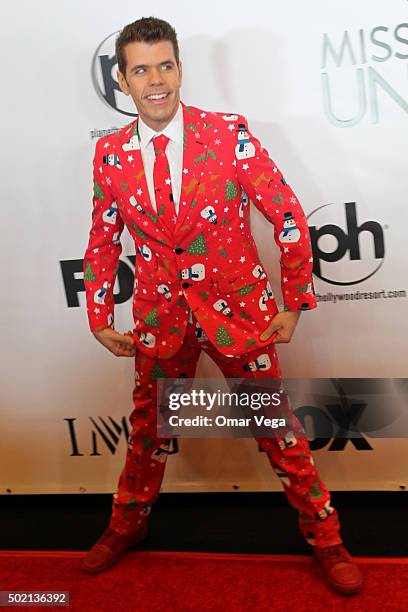 Perez Hilton poses for pictures during the The 64th Annual Miss Universe Pageant Arrivals at The Axis, Planet Hollywood Resort & Casino on December...