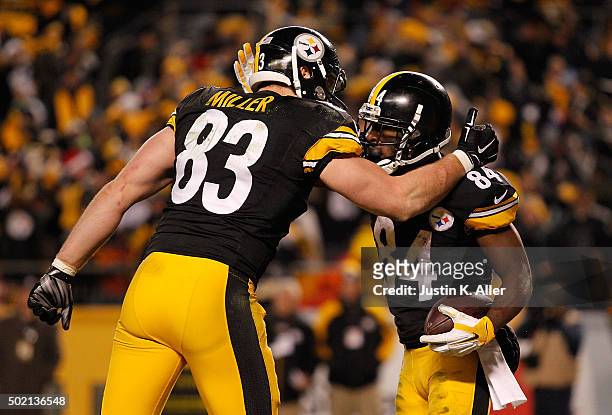 Heath Miller of the Pittsburgh Steelers and Antonio Brown of the Pittsburgh Steelers celebrate Brown's fourth quarter touchdown during the game...