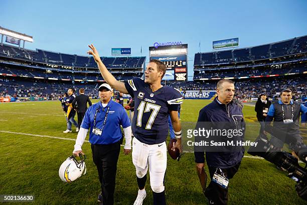 Philip Rivers of the San Diego Chargers waves to fans after the San Diego Chargers defeated the Miami Dolphins 30-14 at Qualcomm Stadium on December...