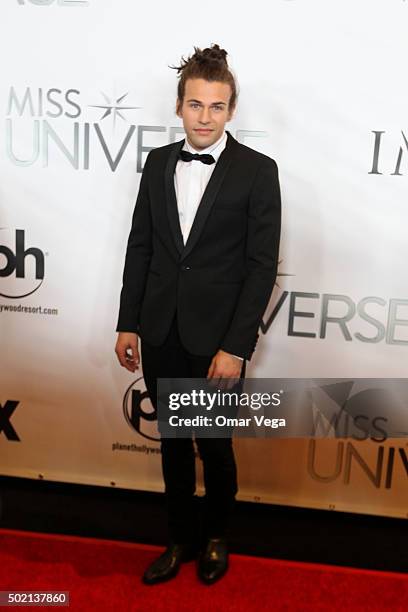 Reid Perry of The Band Perry poses for pictures during the The 64th Annual Miss Universe Pageant Arrivals at The Axis, Planet Hollywood Resort &...