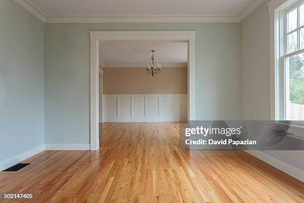 living room with view of dinning room - unfurnished stock pictures, royalty-free photos & images