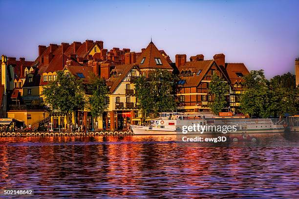 sunet over mikołajki in summer, poland - sniardwy stock pictures, royalty-free photos & images