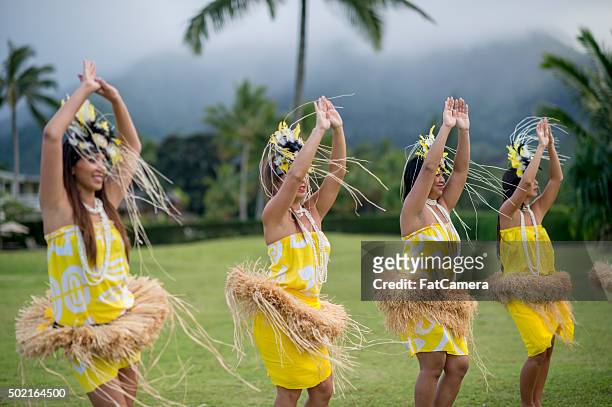 dancing in the tropical weather - hula dancing stock pictures, royalty-free photos & images