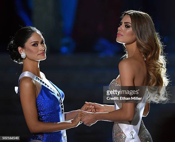 Miss Philippines 2015, Pia Alonzo Wurtzbach , and Miss Colombia 2015, Ariadna Gutierrez Arevalo, hold hands as they wait for the judges' final...