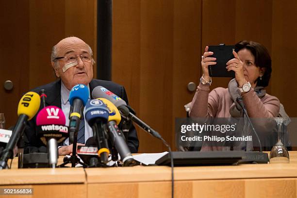 President Joseph S. Blatter and his daughter Corinne Blatter attend a press conference as reaction to his banishment for eight years by the FIFA...