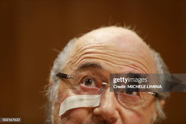 Suspended FIFA president Sepp Blatter looks on during a press conference on December 21, 2015 in Zurich after the world's football governing body...