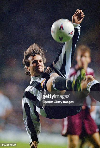 David Ginola of Newcastle in acrobatic action during the UEFA cup 2nd leg tie between Newcastle United and Metz at St.James' Park on December 3, 1996...