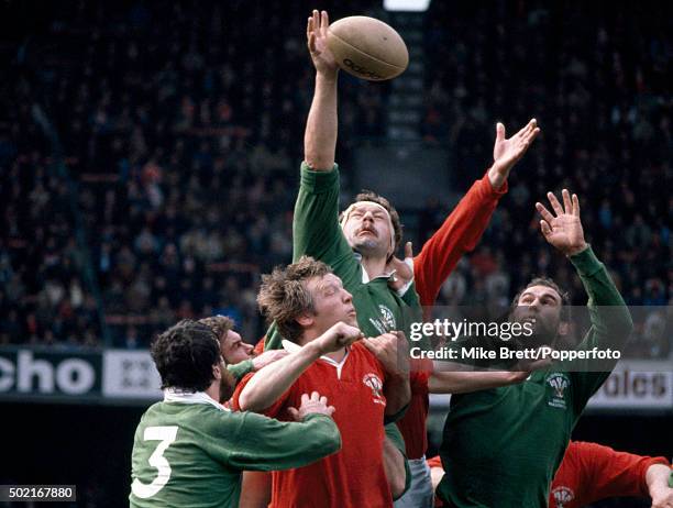Bill Beaumont of the Presidents XV wins a lineout with Andy Haden in support during their rugby union match against Wales at Cardiff Arms Park on...