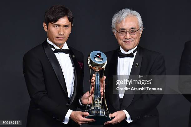 Toshihiro Aoyama of Sanfrecce Hiroshima is awarded as the most valuable player award during the J. League Awards 2015 on December 21, 2015 in Tokyo,...