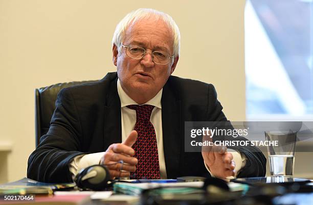 Hans-Joachim Eckert, head of the adjudicatory arm of FIFA's ethics commitee, attends a press conference on December 21, 2015 in Munich, southern...